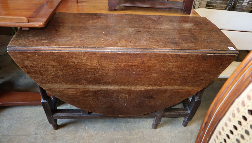 An 18th century oak gateleg table, W.120cm, D.142cm extended, H.74cm